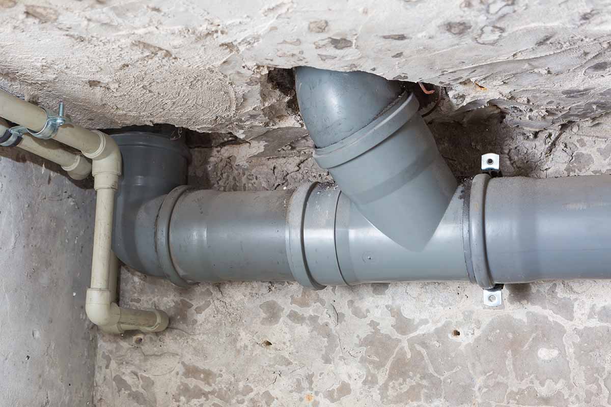 sewage pipes in basement